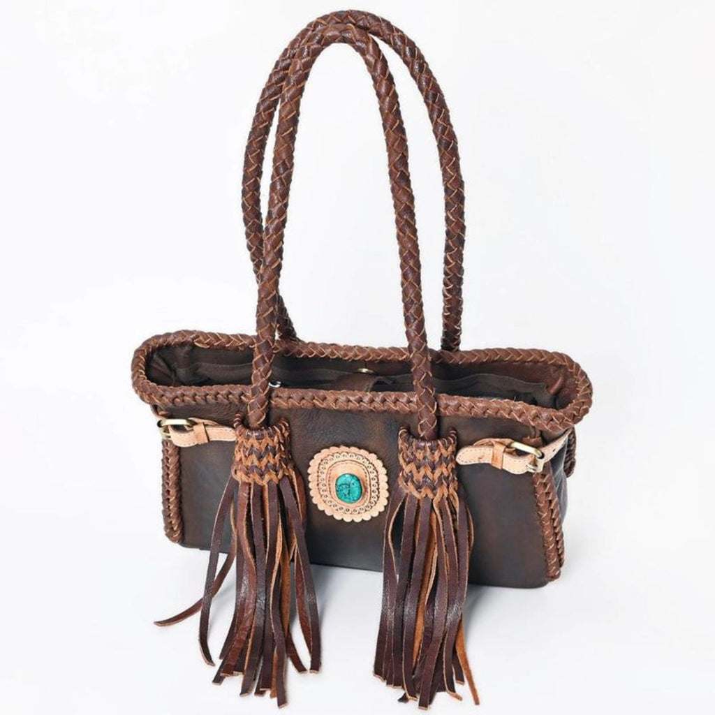 Top view of the Braided Sage Western Leather Tote in Chestnut Brown, showcasing the braided handles, turquoise stone centerpiece, and fringe details.