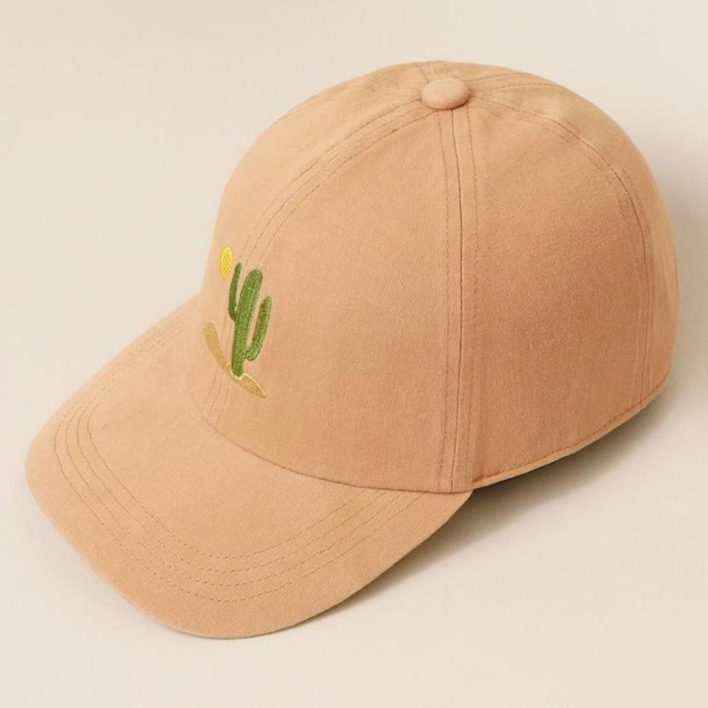 A clay-colored Cactus Embroidered Cotton Baseball Dad Cap featuring a cactus and sun design on the front with a relaxed fit and pre-curved visor.