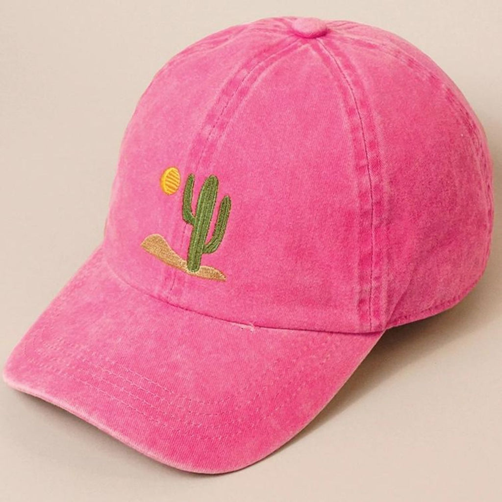 A hot pink Cactus Embroidered Cotton Baseball Dad Cap featuring a cactus and sun design on the front with a relaxed fit and pre-curved visor.