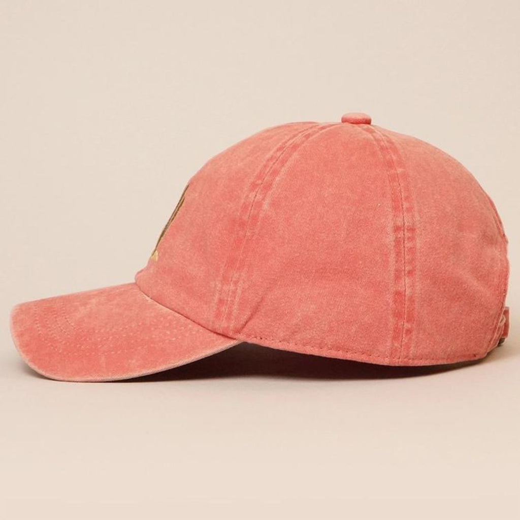 A side view of a faded red Cactus Embroidered Cotton Baseball Dad Cap featuring a relaxed fit and pre-curved visor.