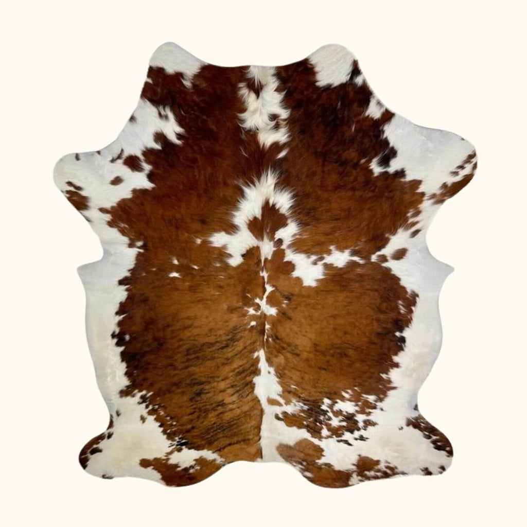 Cow Skin Rug - Elevate your space with the rustic charm of our premium cow skin rug.