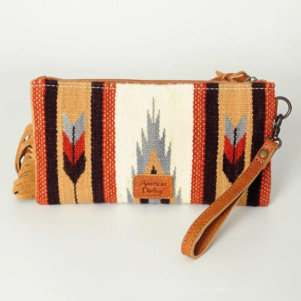 Back view of the Desert Bloom Handcrafted Wristlet showcasing woven wool design and leather wrist strap.