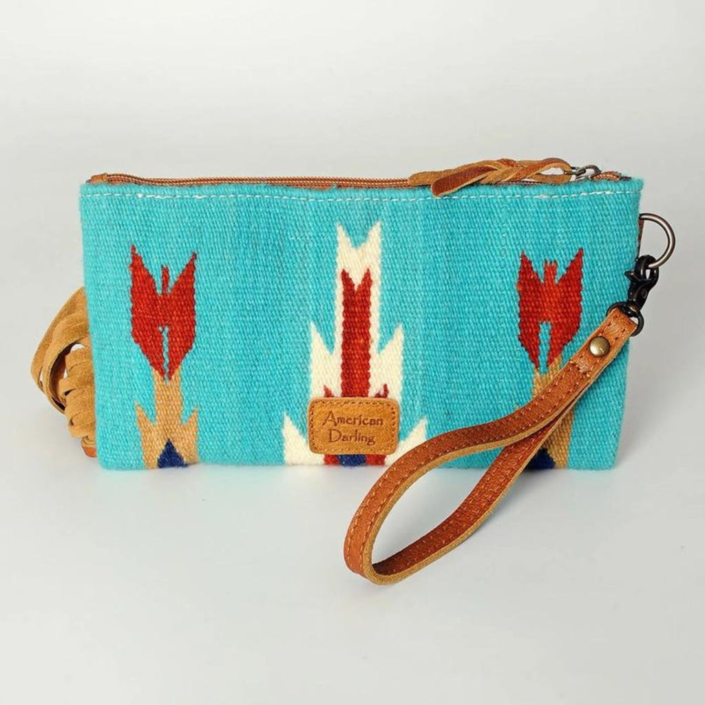 Back view of the High Plains Heritage Wristlet showing turquoise woven pattern and leather wrist strap.