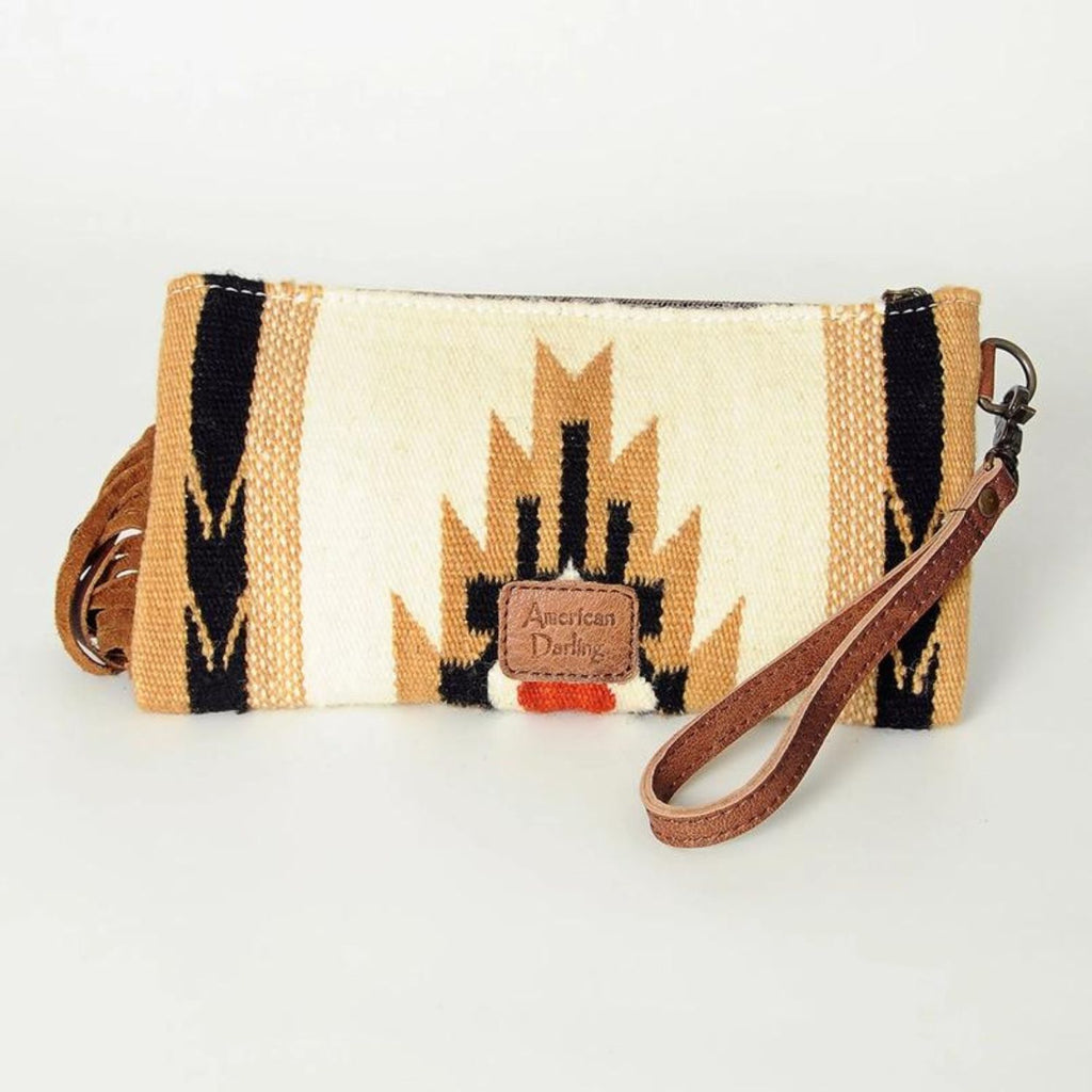 Back view of the Saddle Blanket Sunset Wristlet showcasing woven wool pattern and leather wrist strap.