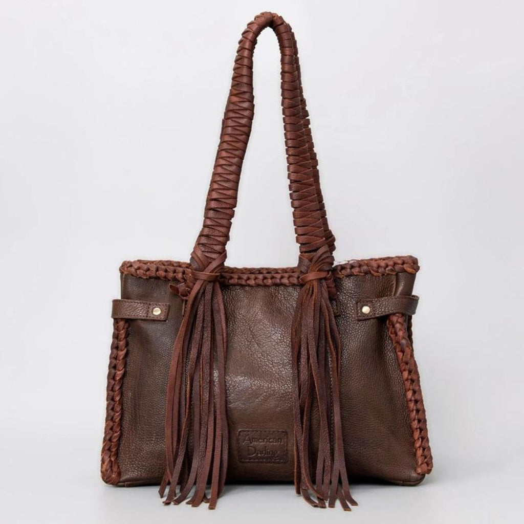 Back view of the Saddle Brown Western Braided Leather Tote featuring braided leather handles and fringe detailing.