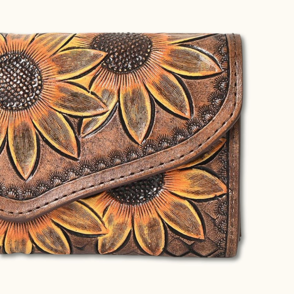 Close-up view of the Sunflower Bliss Handcrafted Leather Wallet showcasing the intricate hand-tooled sunflower design and detailed craftsmanship.