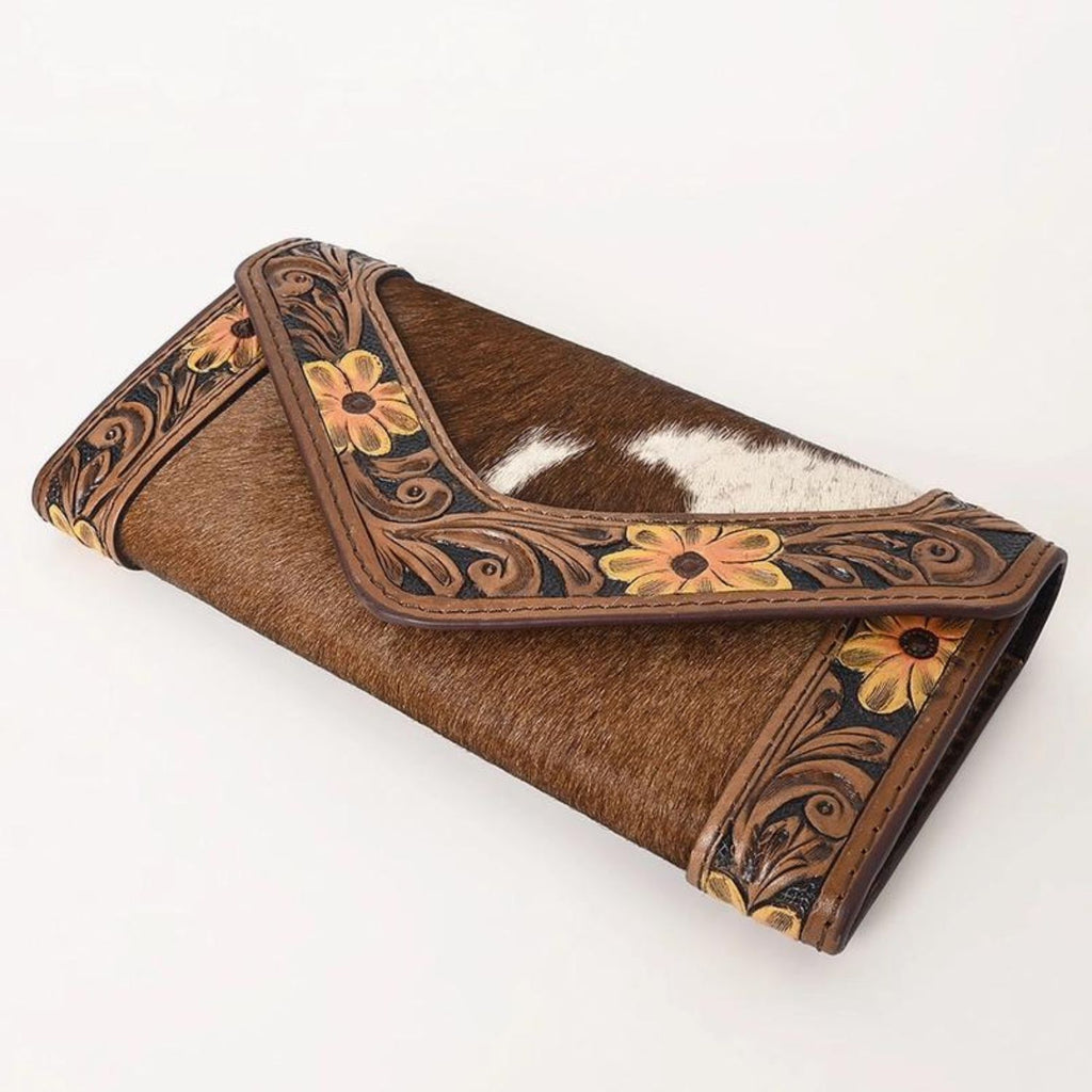  Side view of the Sunflower Trail Leather Wallet showcasing intricate floral tooling and vibrant sunflower designs on genuine cowhide leather.