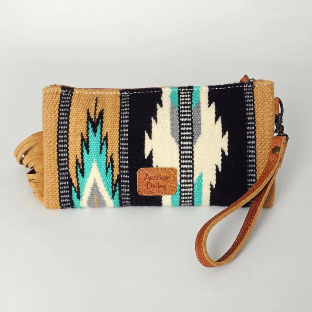 Back view of the Western Trails Leather Fringe Wristlet showcasing the black and turquoise woven pattern and leather wrist strap.