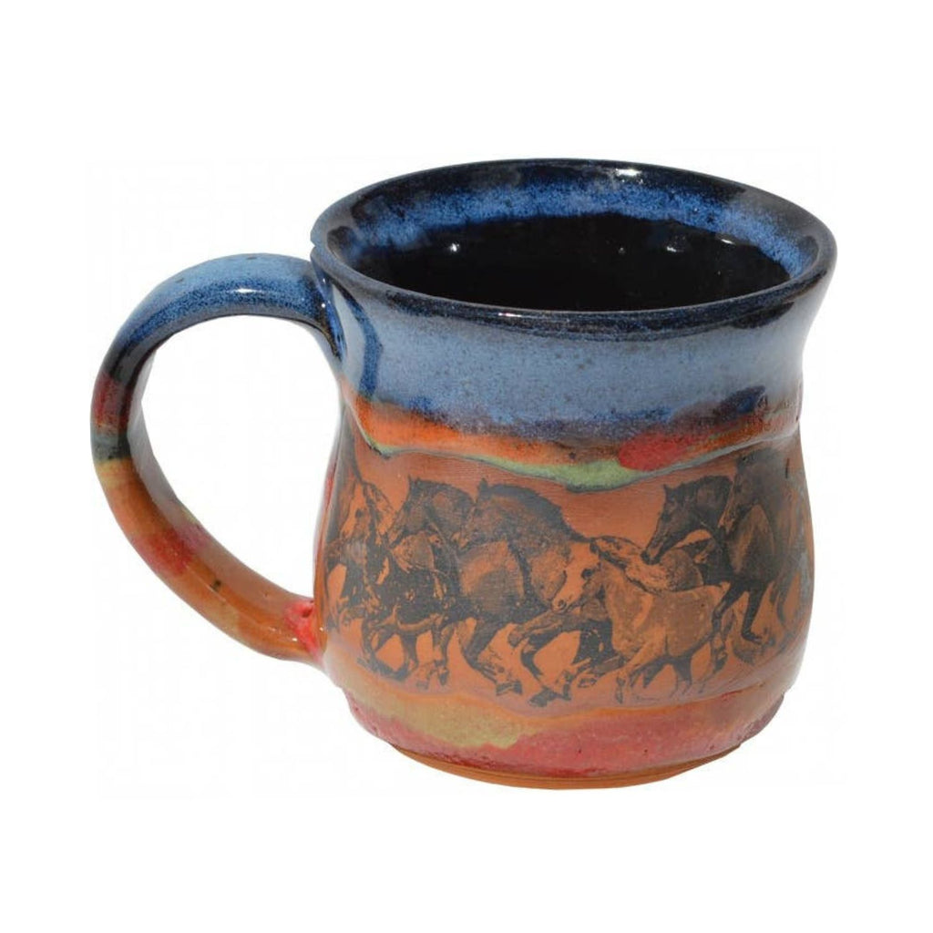 Handcrafted pottery mug featuring galloping horses design